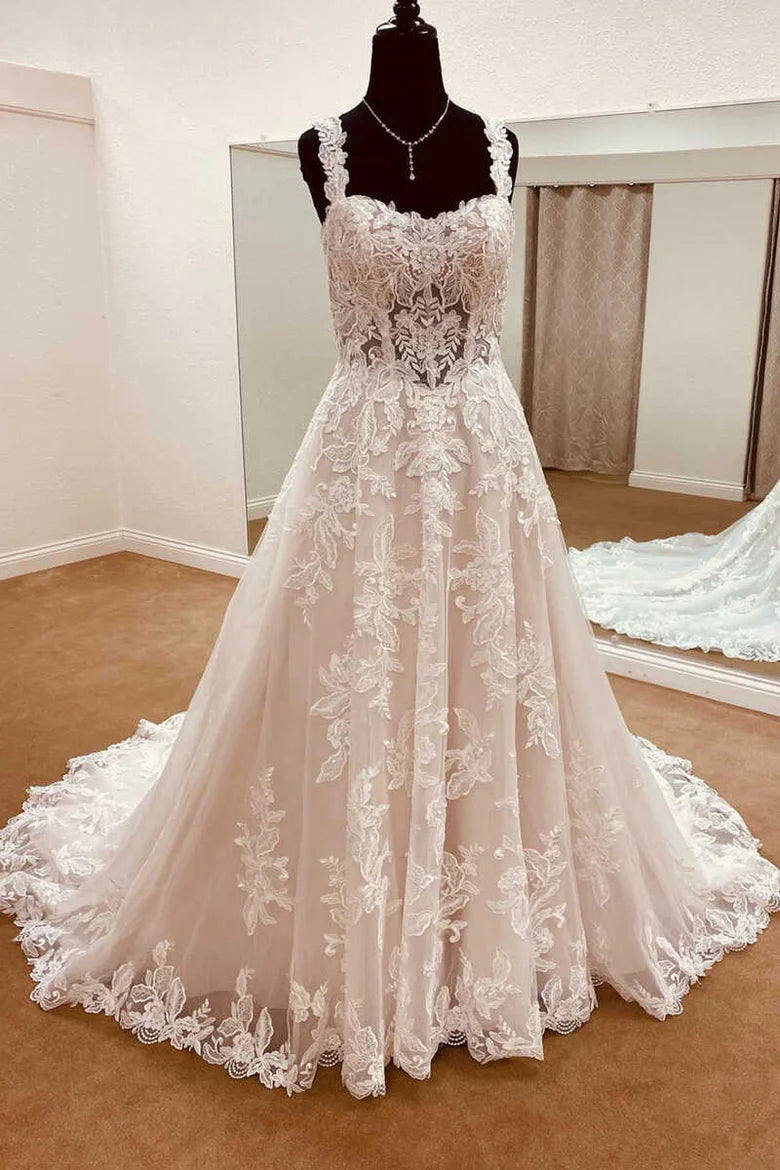 Vestido de novia largo de corte A con tirantes de encaje y escote en forma de corazón